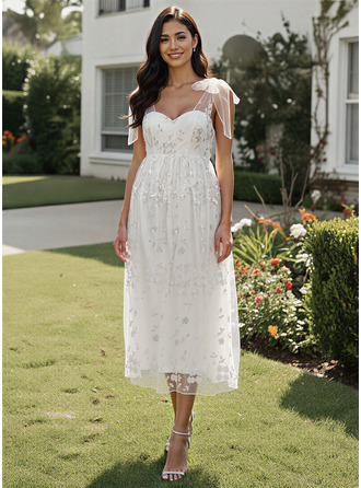 Línea a cuello de corazón hasta la tibia vestido premamá con lazo 