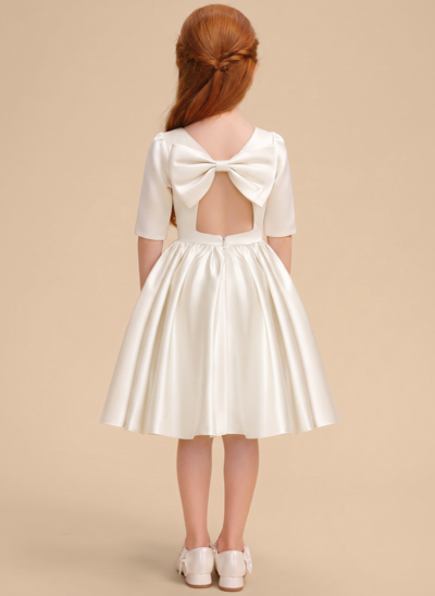Vestido línea a con lazo de satén