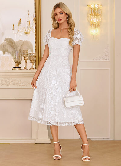 Vestido midi con borde de flecos de encaje